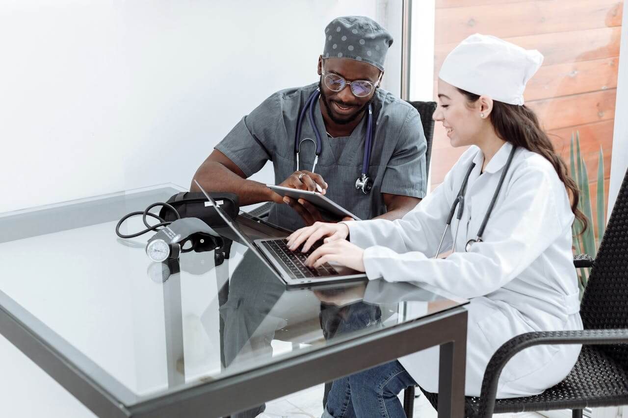 Doctors collaborating with secure software 