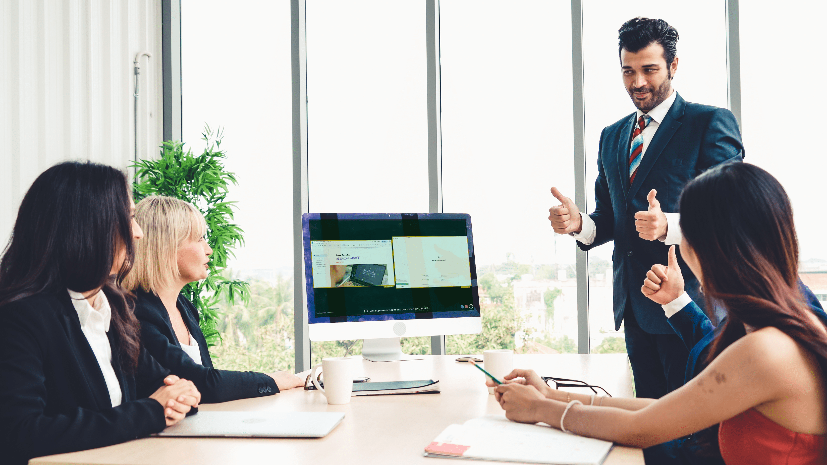 Mersive Collaboration Suite in a four person meeting