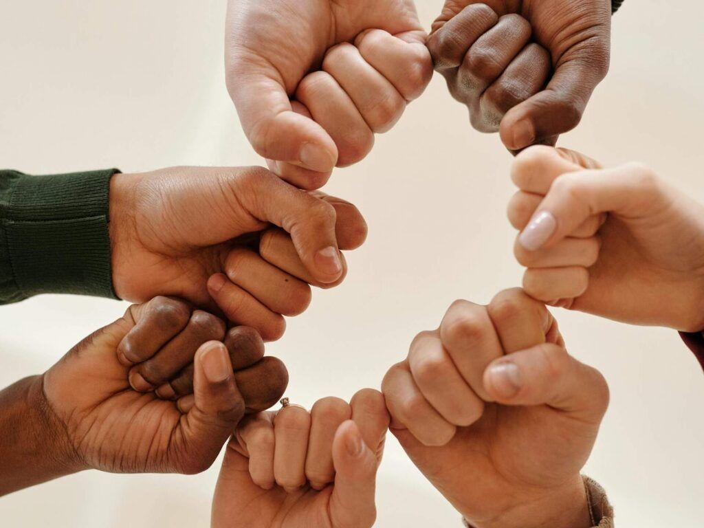 Fist bump, teamwork